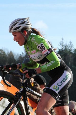 Sophie de Boer pushing her bike