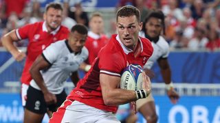 George North for Wales runs with the ball in the Rugby World Cup game against Fiji