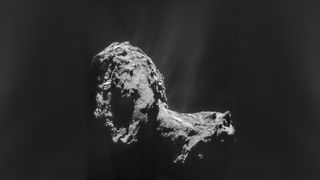 a black and white image of an irregularly-shaped comet