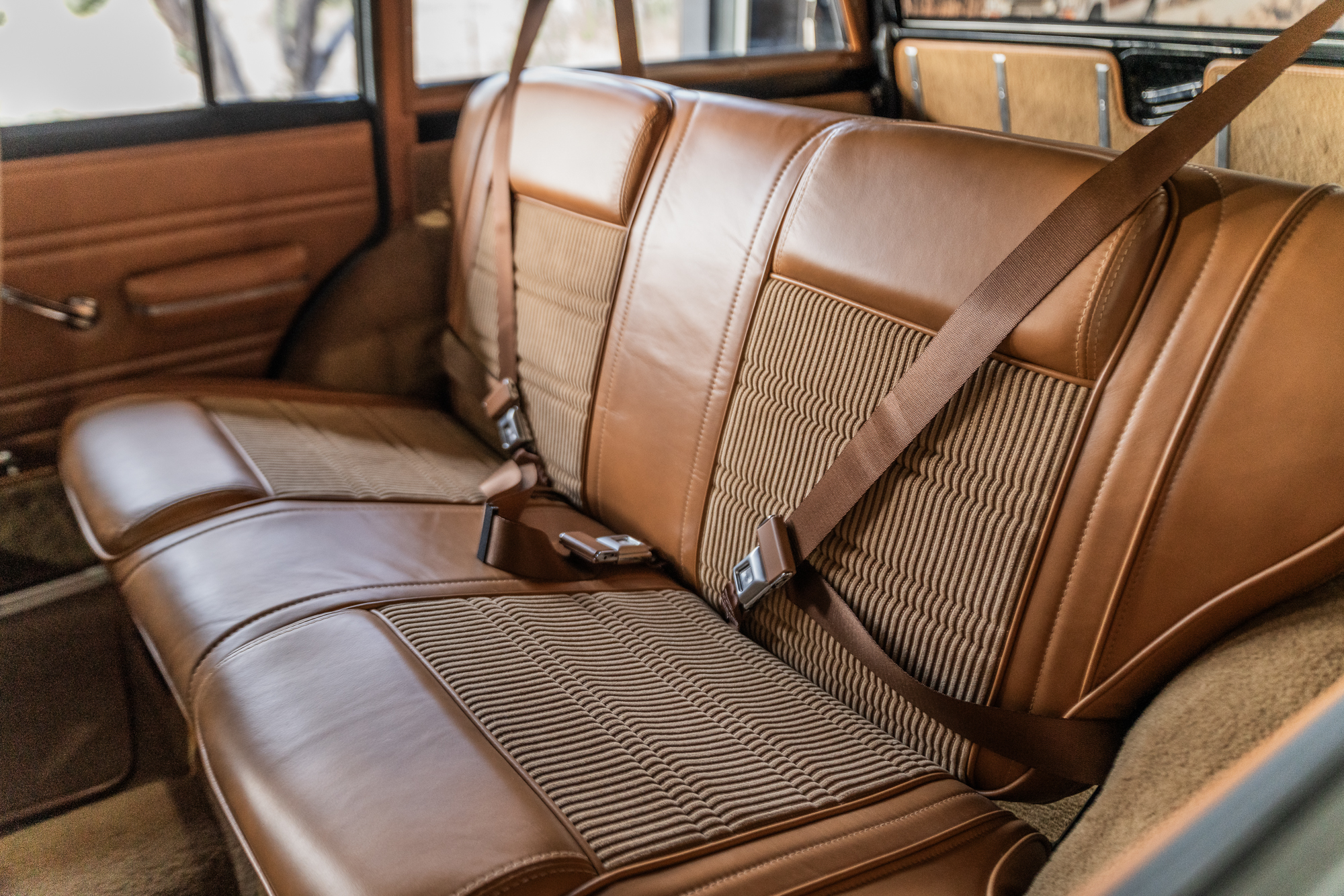 The leather seats have corduroy inserts