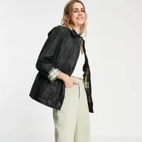 Barbour Beadnell wax jacket in black, Was £219.00, Now £164.25 | ASOS (25% off)