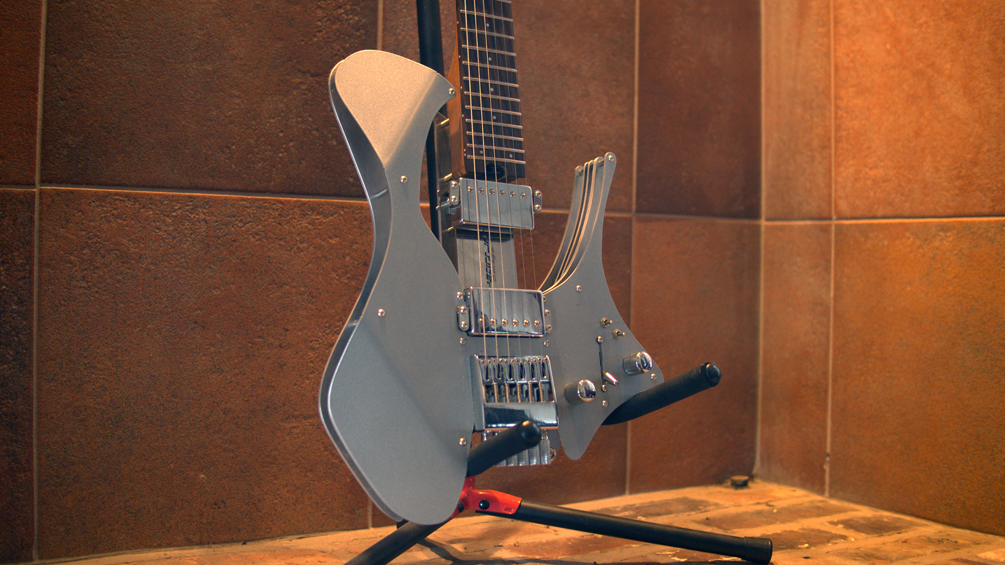 Pearson Omega guitar, shot in a tiled fireplace