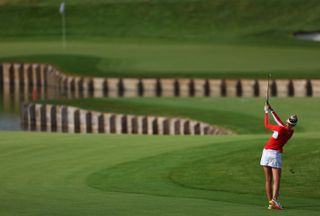 Nelly Korda hits a tee shot into the first