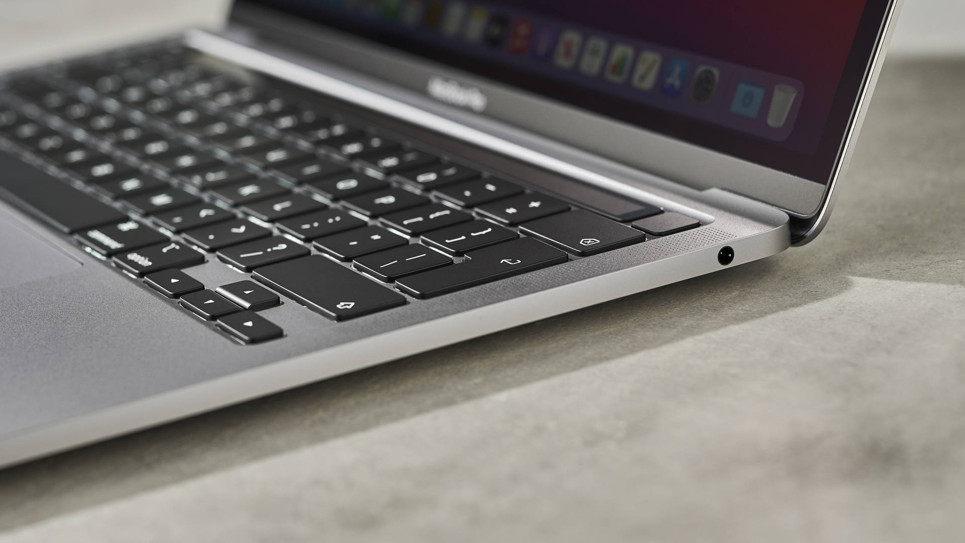 Apple MacBook Pro 13-inch (M1, 2020) on a marble surface