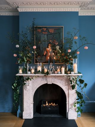 Christmas mantelpiece with foraged foliage by Farrow & Ball