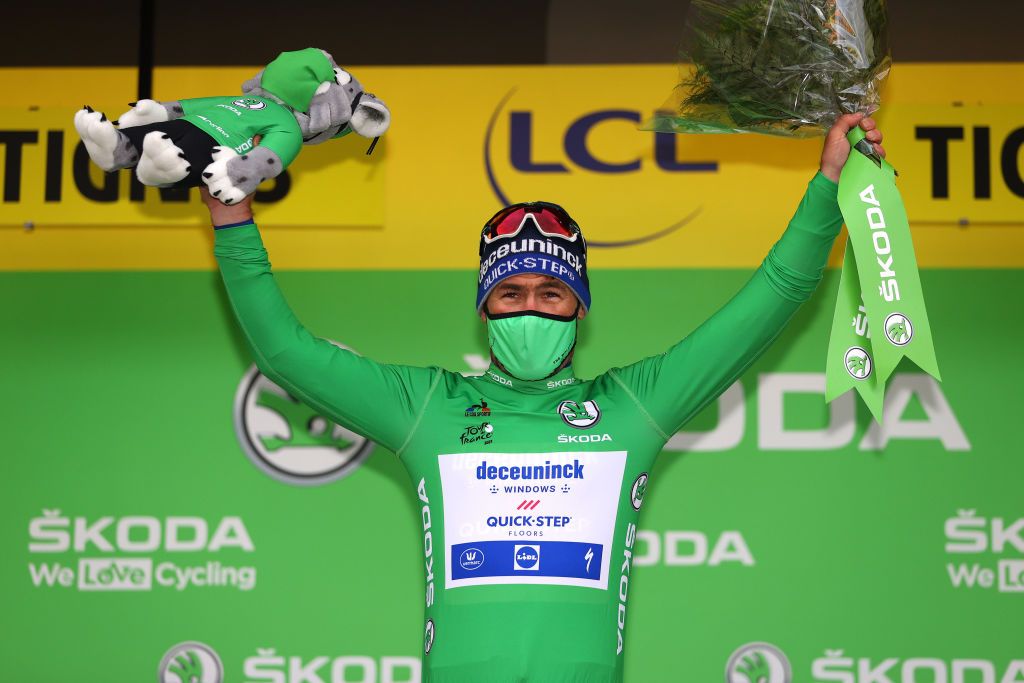 TIGNES FRANCE JULY 04 Mark Cavendish of The United Kingdom and Team Deceuninck QuickStep Green Points Jersey celebrates at podium during the 108th Tour de France 2021 Stage 9 a 1449km stage from Cluses to Tignes Monte de Tignes 2107m LeTour TDF2021 on July 04 2021 in Tignes France Photo by Tim de WaeleGetty Images
