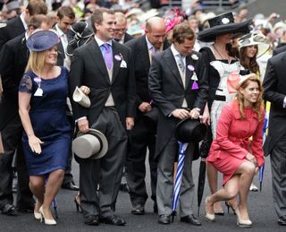 Autumn Phillips, Peter Phillips, Dave Clark and Princess Beatrice curtsey and bow to Queen Elizabeth II as they attend day 5 of Royal Ascot at Ascot Racecourse on June 23, 2012 in Ascot, England