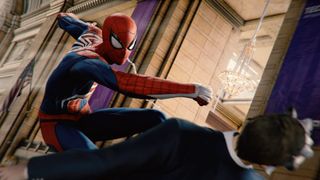 Spider-Man punches a besuited man to the ground