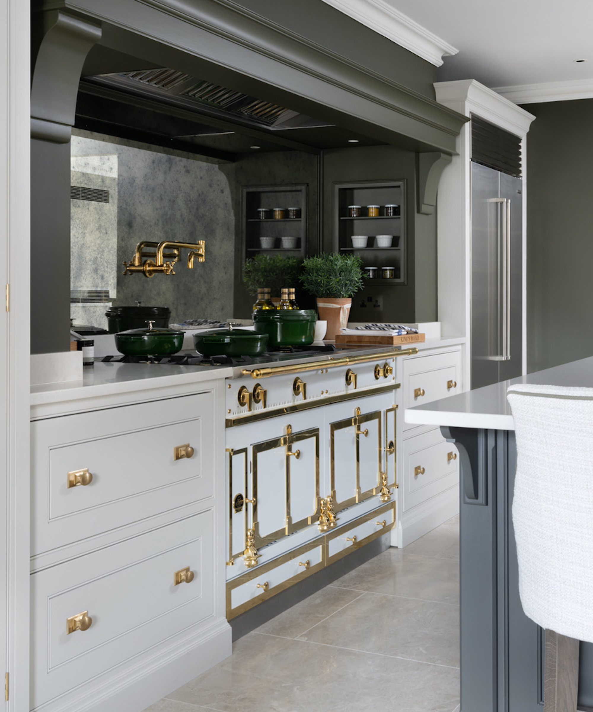 white kitchen with antique mirror backsplash