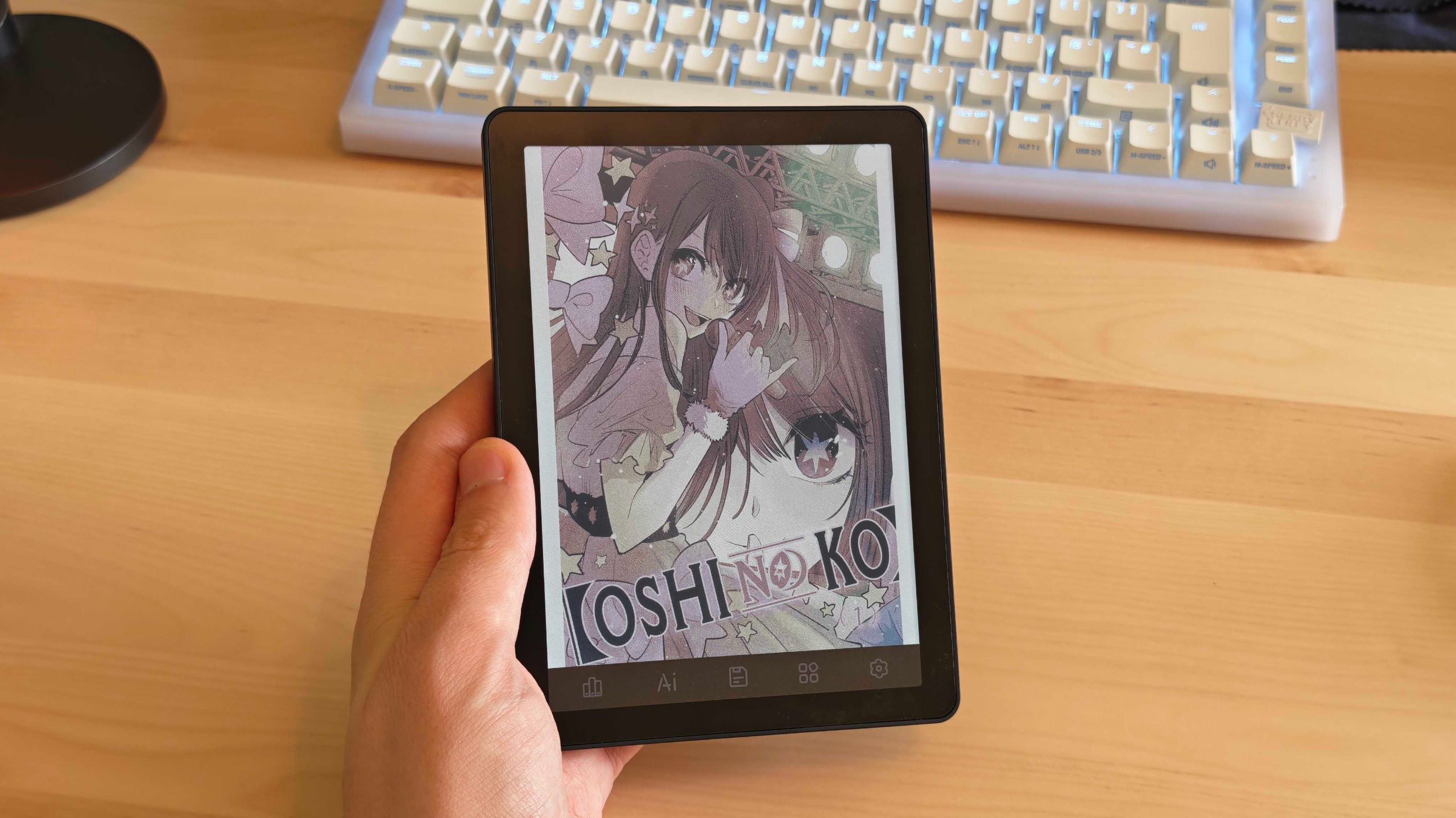 The Bigme B6 Color e-reader on a clean desk surface.