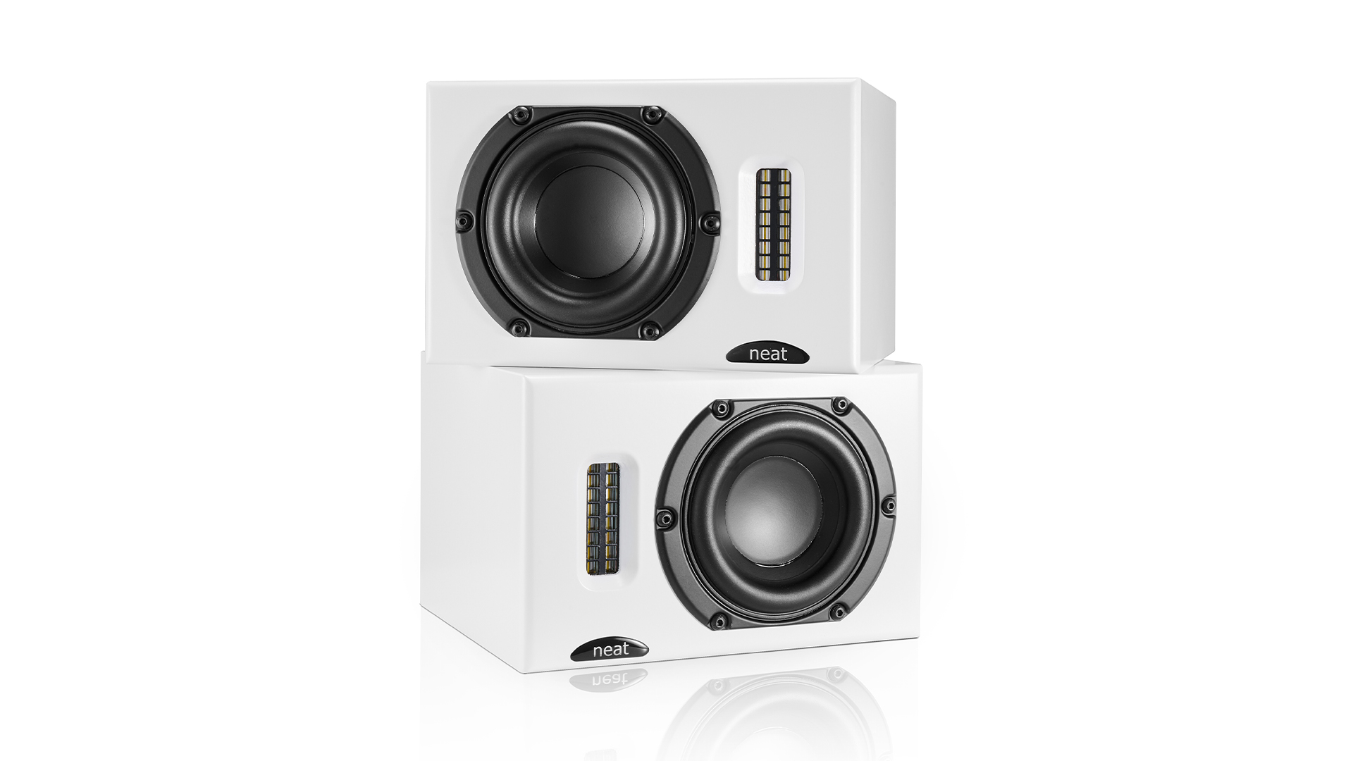 Neat Iota II speakers in white finish against white background