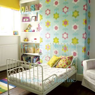 childrens room with floral wallpaper
