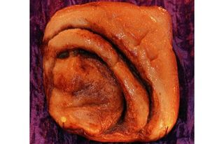 A cinnamon bun that some people say looks like Mother Theresa