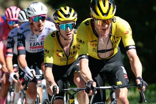Team Visma-Lease a Bike's British rider Simon Yates (2nd R) rides in the pack during the ascent of Col De Joux (Joux Pass) in the 19th stage of the 108th Giro d'Italia cycling race of 166kms from Biella to Champoluc on May 30, 2025. (Photo by Luca Bettini / AFP)
