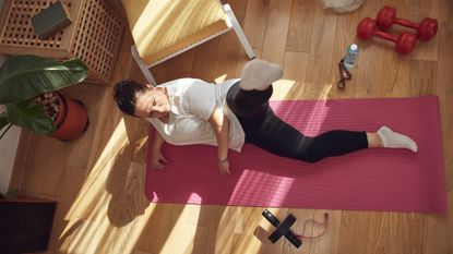Woman exercising at home