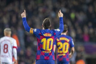 Lionel Messi celebrates after scoring Barcelona's first goal in a 5-2 win over Mallorca at Camp Nou in 2019.