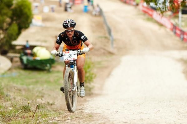 Katherine O'Shea climbs the steep hill on the last lap setting herself up for victory
