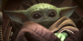 Baby Yoda and Mando in The Mandalorian