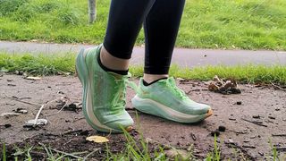 Woman's feet wearing Hoka Mach X running shoes
