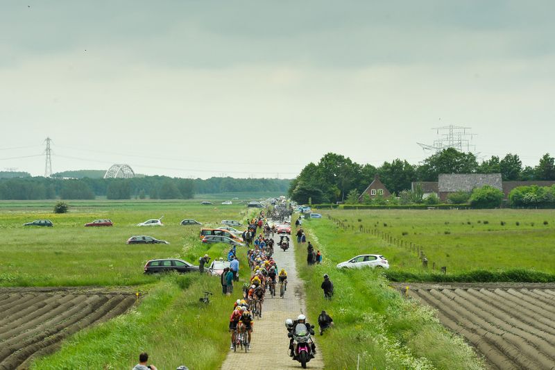 The peloton passes over a sector of pave during the first stage