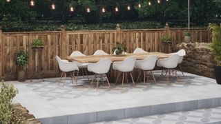 patterned tiles on raised patio with table and chairs