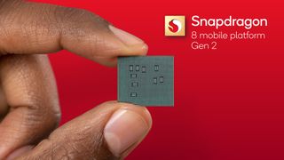 The Snapdragon 8 Gen 2 held between two fingers