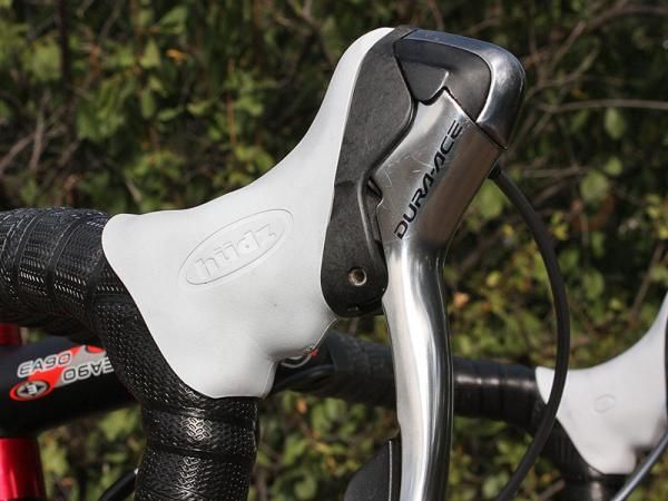 Molded-in finger grips on the underside of the Hudz provide a secure place to grab on to