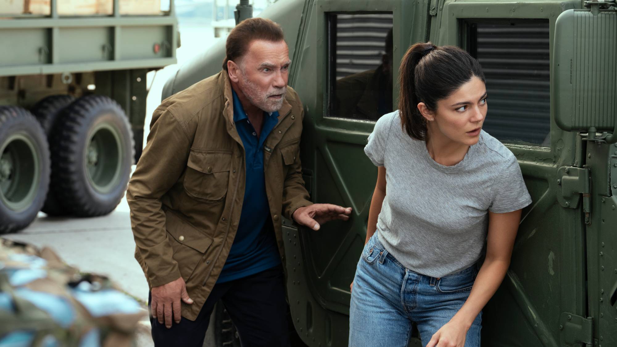 Arnold Schwarzenegger as Luke Brunner and Monica Barbaro as Emma Brunner in "Fubar" season 2