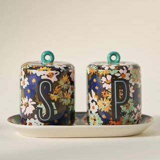 Floral salt and pepper shakers on a small tray