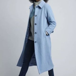 Long wool rich coat on model 