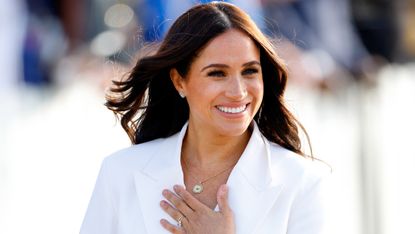 Meghan Markle wearing her engagement ring as attends an Invictus Games Friends and Family reception