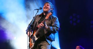 Brian Fallon plays a Strat as he performs live with the Gaslight Anthem 