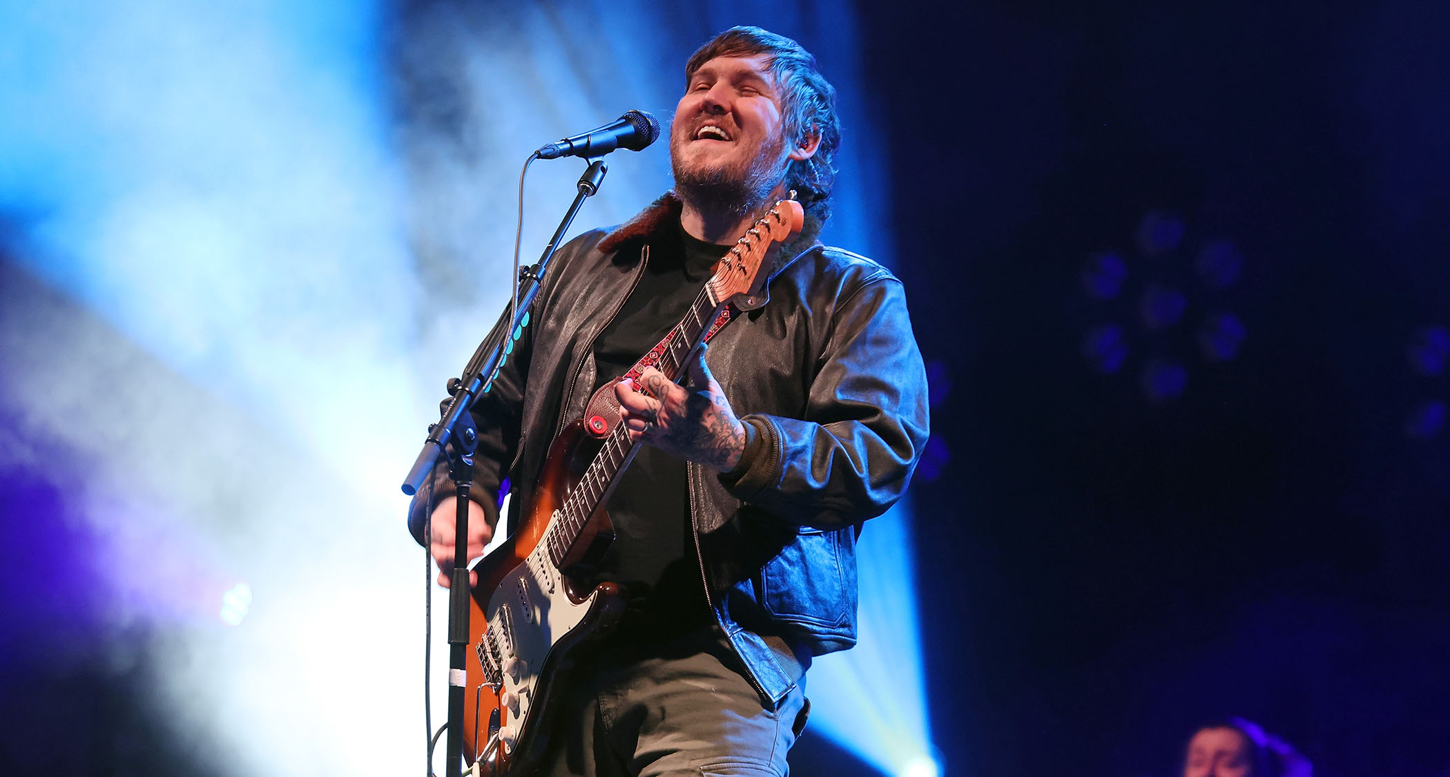 Brian Fallon plays a Strat as he performs live with the Gaslight Anthem 