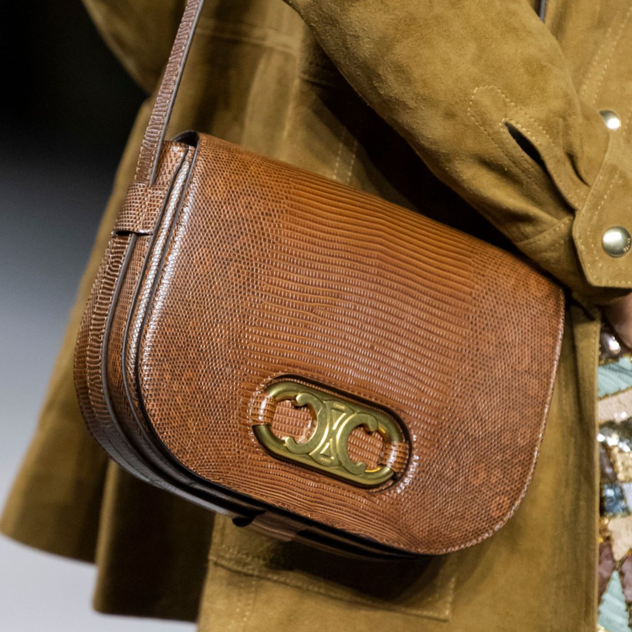 woman wearing a celine bag 