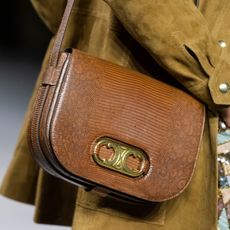 woman wearing a celine bag 