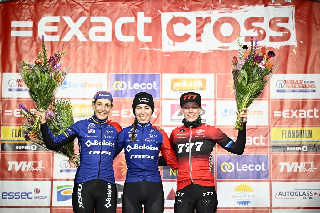 Dutch Lucinda Brand L Dutch Shirin van Anrooij C and Dutch Annemarie Worst R celebrate on the podium after the womens elite race of the Zilvermeer Mol cyclocross cycling event race 58 in the Exact Cross competition in Mol on December 23 2022 Belgium OUT Photo by JASPER JACOBS BELGA AFP Belgium OUT Photo by JASPER JACOBSBELGAAFP via Getty Images