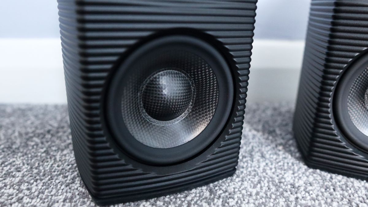 FiiO SP3 BT computer speakers set up on the floor.
