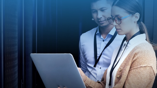 Whitepaper from Dell on improving your infrastructure cyber-resilience with server security, with image of colleagues looking at a laptop on the cover