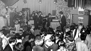 Love performing onstage in the Whiskey A Go Go club in Los Angeles in the late 1960s