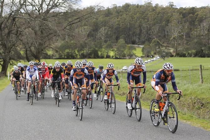 Joe Cooper (Huon-Genesys) still driving the peloton.
