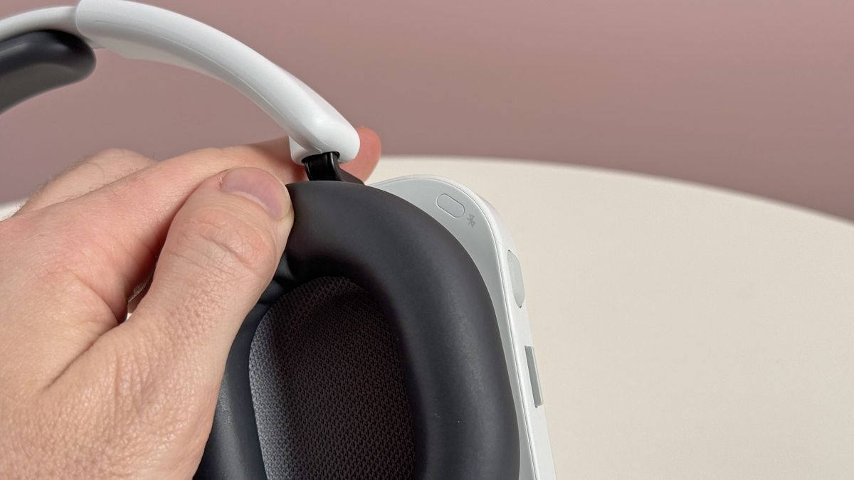 The Nothing Headphone (a) showing the Bluetooth pairing button on the inside of the earcup