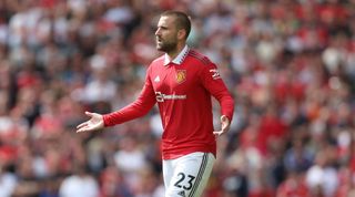 Manchester United defender Luke Shaw gesturing during Manchester United 1-2 Brighton & Hove Albion in the Premier League on 7 August, 2022 at Old Trafford, Manchester, United Kingdom
