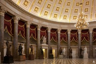 National Statuary Hall, also known as the Old Hall of the House, is the large, two-story, semicircular room south of the Rotunda in the U.S. Capitol in Washington, D.C.