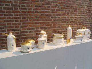 A range of ceramics in white and gold