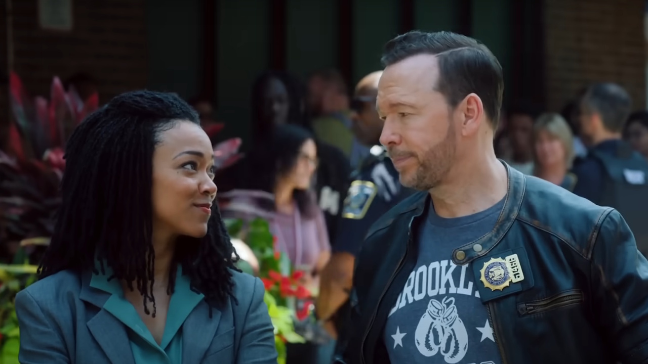 Lena Silver (Sonequa Martin-Green) and Danny Reagan (Donnie Wahlberg) look at each other in the preview for Boston Blue. 