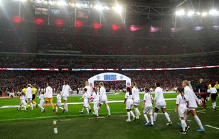 England Women take to the field against Germany in 2019 at Wembley