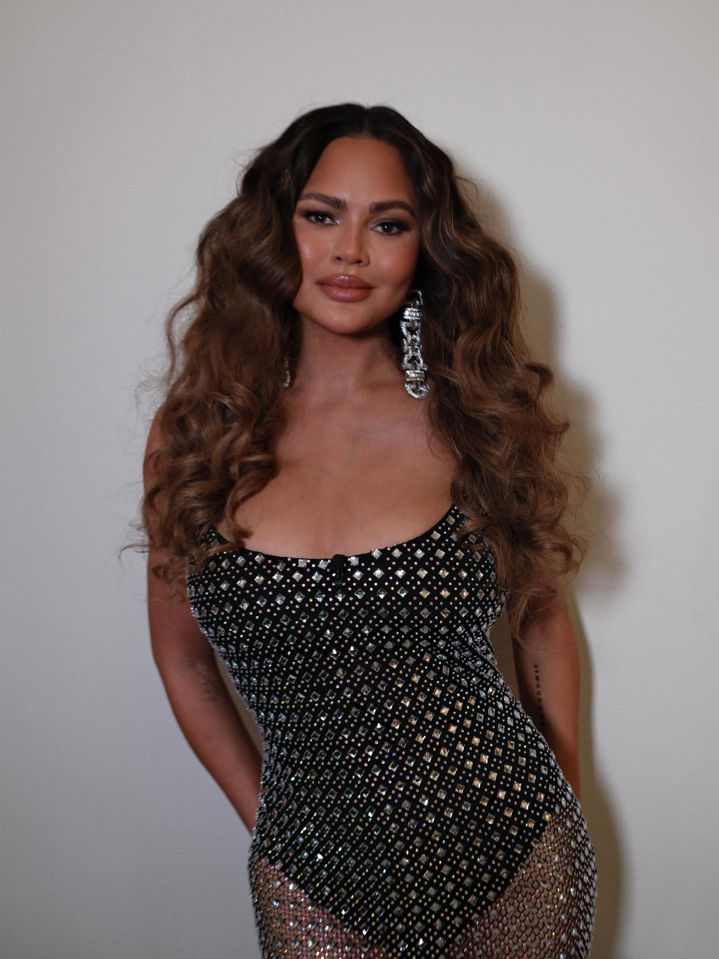 Chrissy Teigen with molten brunette hair colour