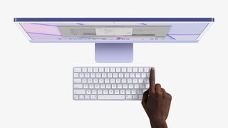 iMac 2021 in purple showing Touch ID on keyboard