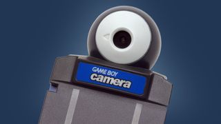 The Game Boy Camera accessory on a blue background