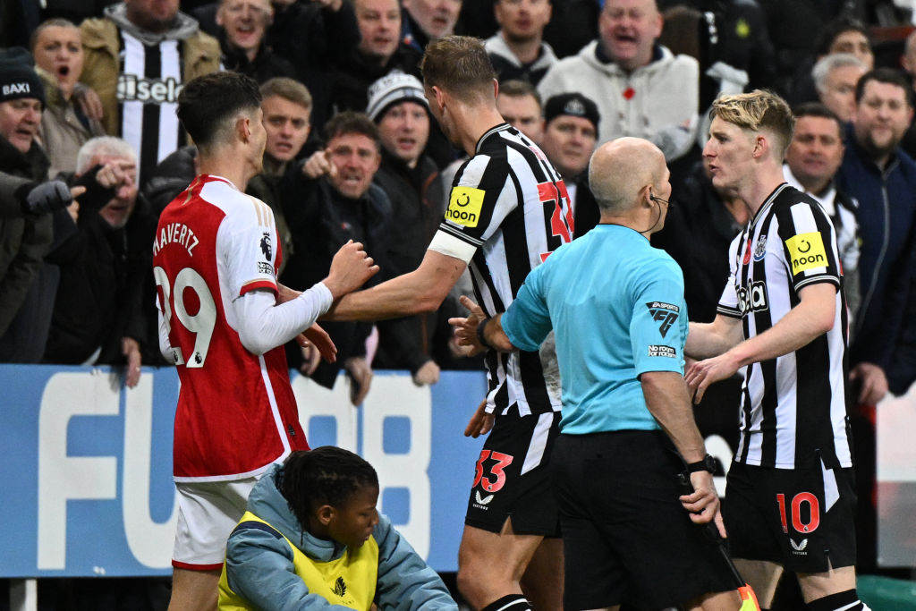 Kai Havertz (L) is challenged by Newcastle players after a bad foul on Newcastle United&#039;s English midfielder #36 Sean Longstaff during the English Premier League football match between Newcastle United and Arsenal at St James&#039; Park in Newcastle-upon-Tyne, north east England on November 4, 2023